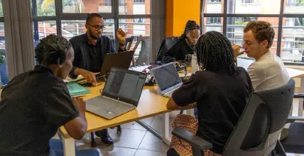 Partners meeting around a table